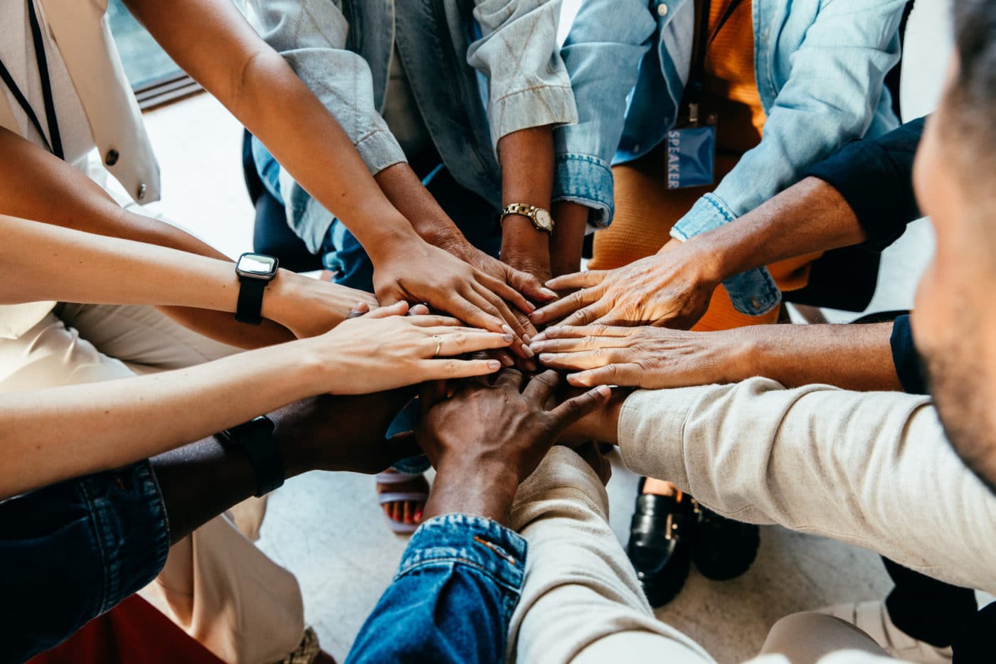 Teamwork Concept With Diverse Hands Joining Together, Symbolizing Unity ...
